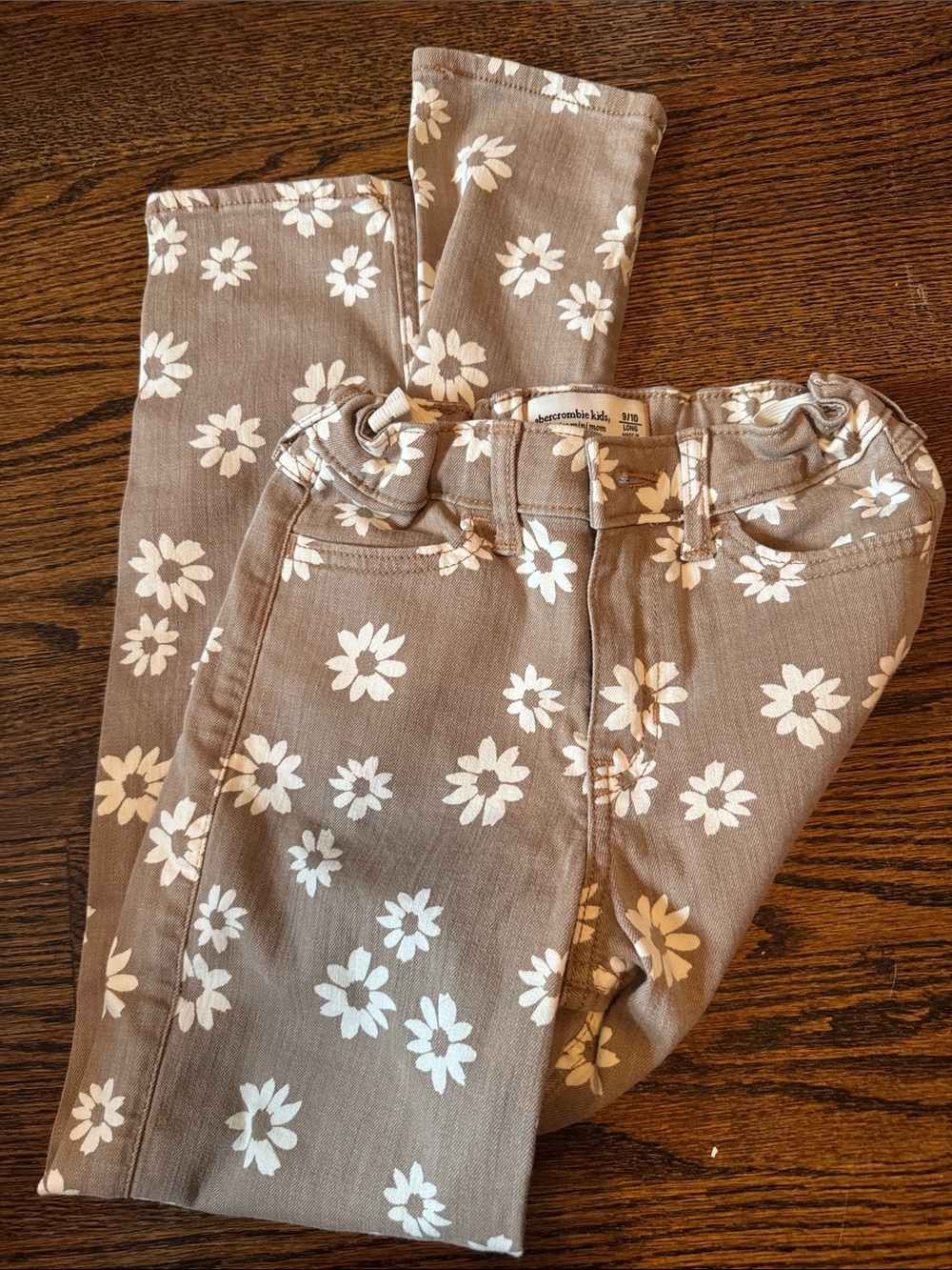 abercrombie kids taupe pants with white daisy print
